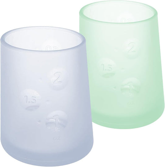 Olababy First Cup | Clear Sense 100% Silicone Infant Trainer Cup | 2oz Medicine Cup for Newborn | Non-Slip & Sloping Design for Tiny Hands & Baby Led Weaning (Blueberry/Mint, 2 Cups)