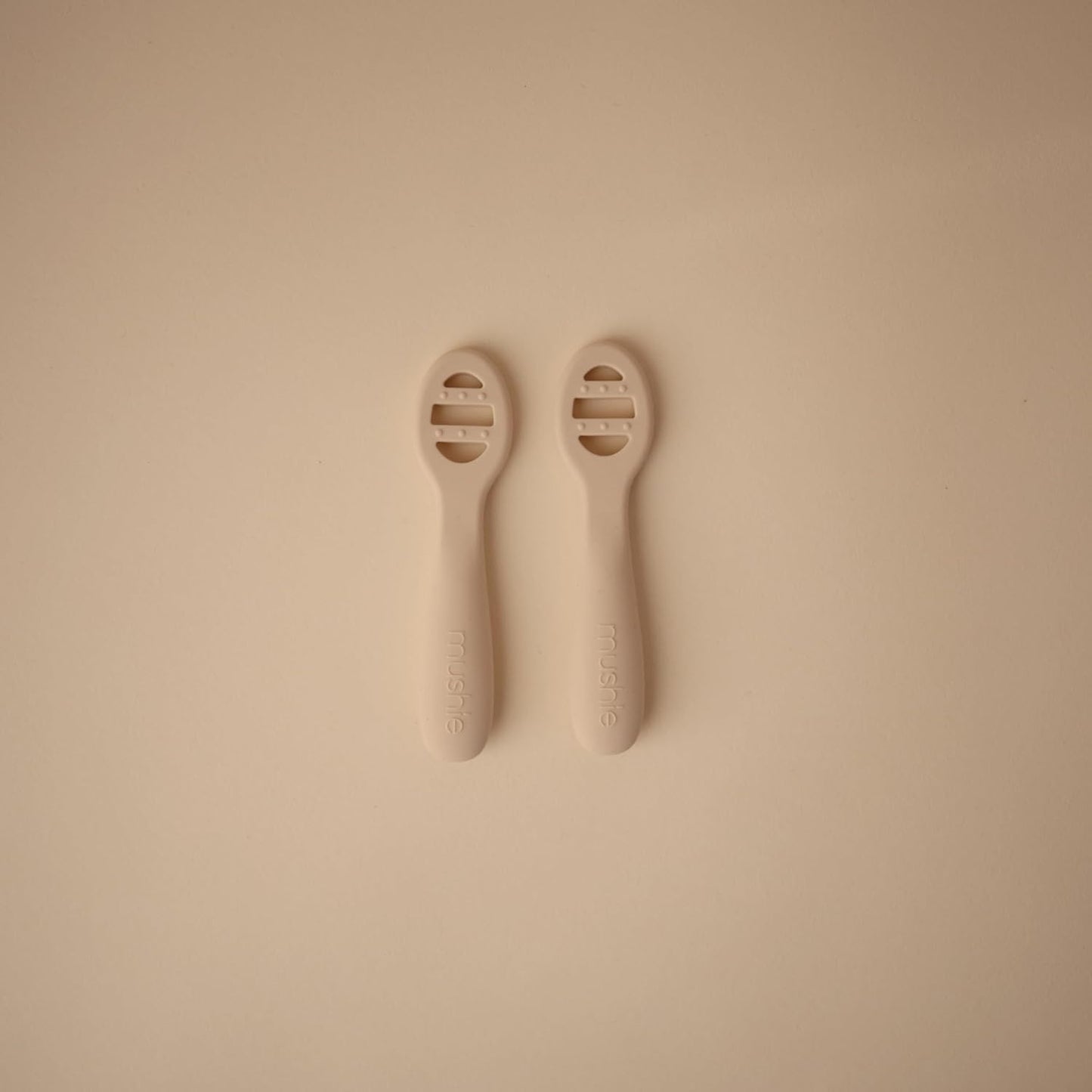 mushie Silicone First Feeding Baby Spoons | 2 Pack (Natural/Shifting Sand)