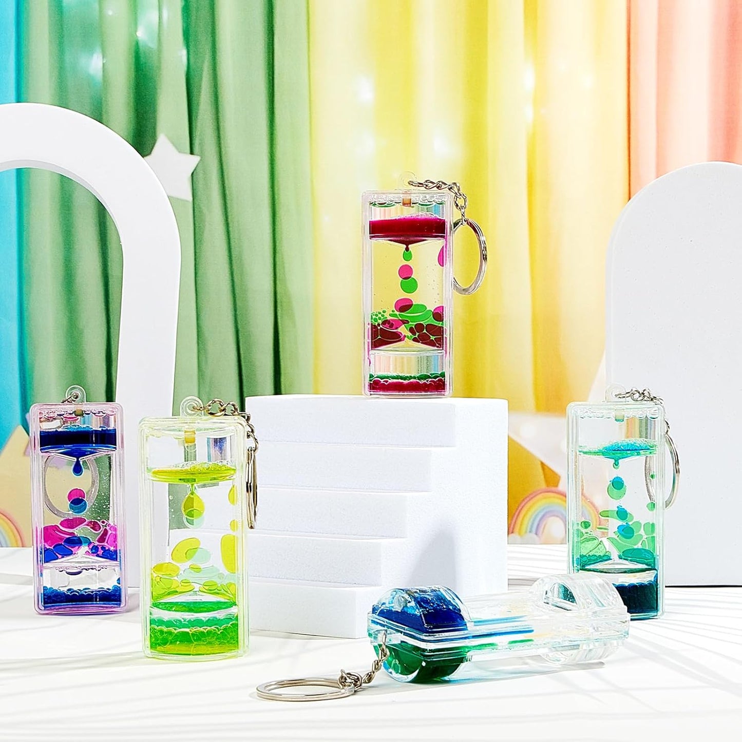 12 Pcs Liquid Motion Bubbler Keychains, Liquid Motion Bubbler Sensory Toys Liquid Keychain Fidget Keychain for Adults Stress Relief Gifts Calming Toys Party Favors Bag Pendant, 4 Styles